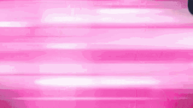 a cartoon character with blue hair is bending over on a pink background .