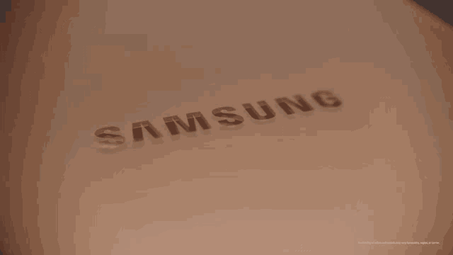 the word samsung is on a piece of paper