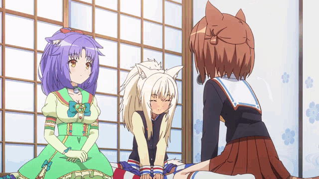 three anime girls are sitting in a room with a sliding glass door in the background