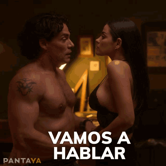 a man and a woman are looking at each other with the words vamos a hablar written above them