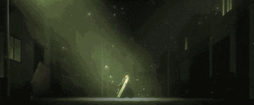 a man in a green suit is holding a green sword in his hand .