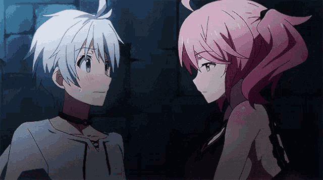 a boy and a girl are standing next to each other