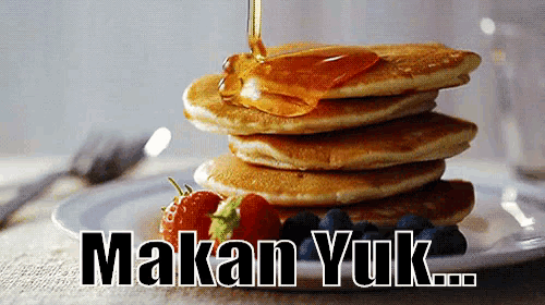 a stack of pancakes with syrup being poured on top and the words makan yuk below