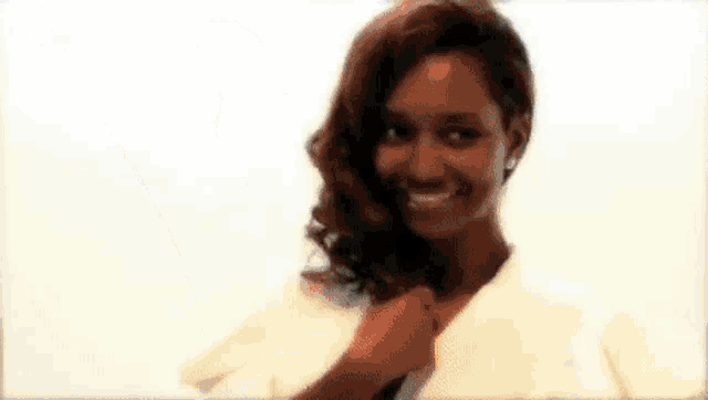 a woman in a long black dress is standing on a white background