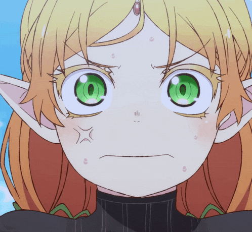a close up of a girl with green eyes