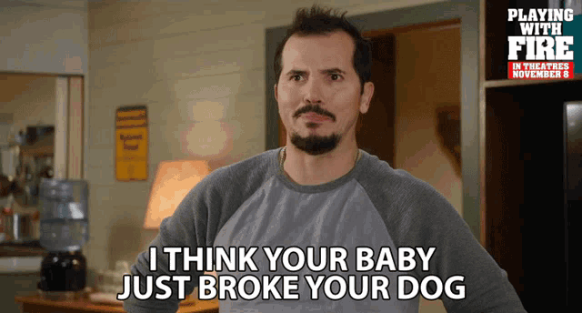 a man says " i think your baby just broke your dog " in front of a poster for playing with fire