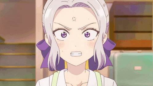 a girl with a purple bow on her head has an angry expression on her face