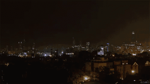 a lightning bolt strikes over a city at night with the hashtag #shirou