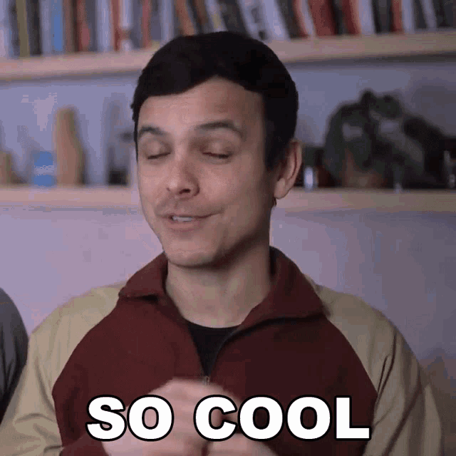 a man in a maroon jacket says so cool in white letters