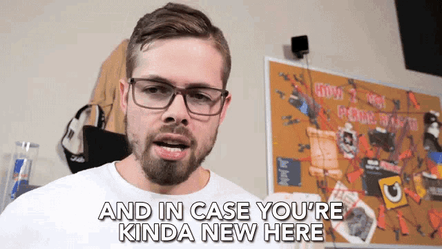 a man wearing glasses and a white shirt says " and in case you 're kinda new here "