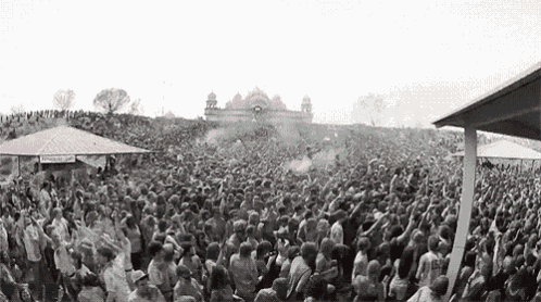 a black and white photo of a crowd of people