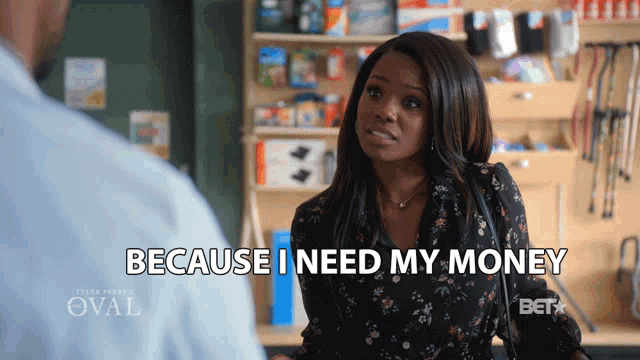 a woman talking to a man with the words because i need my money above her
