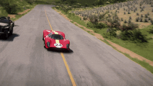 a red race car with the number 24 on the side of it