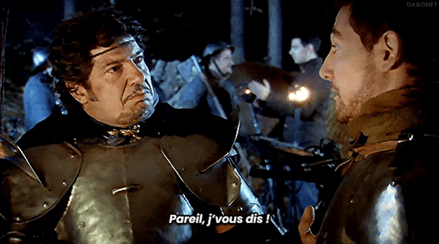 a man in armor is talking to another man and the man in armor says " paroit j'vous dis "