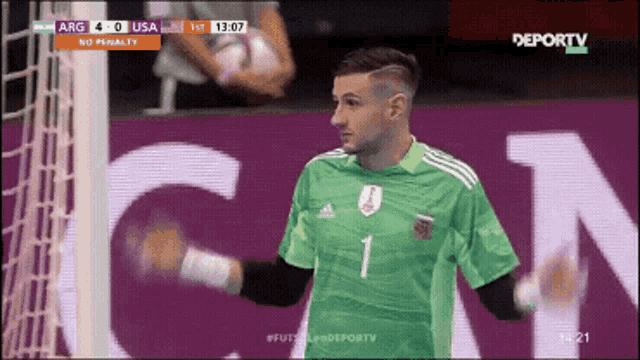a man in a green jersey with the number 1 on the front
