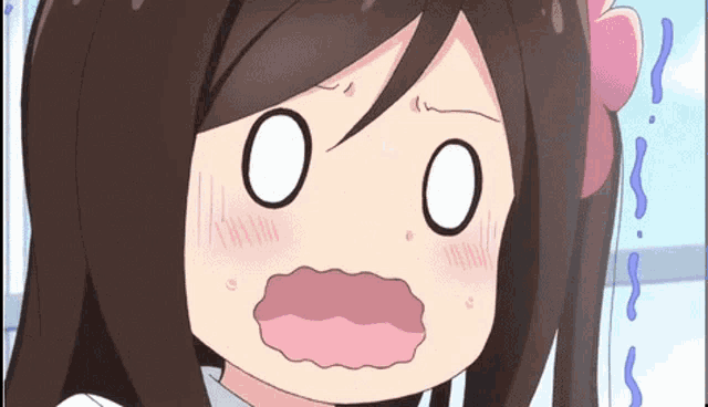 a close up of a cartoon girl with a surprised expression on her face