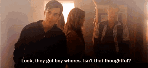 a man and a woman are standing next to each other and the man says look they got boy whores isn t that thoughtful