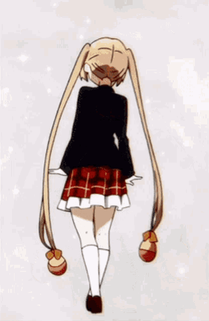a girl with pigtails wearing a plaid skirt is walking