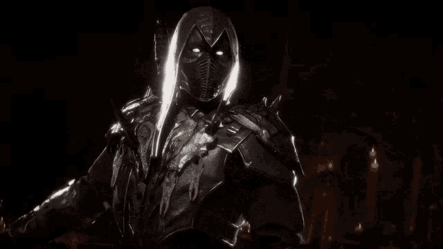 a black and white photo of a person in a costume