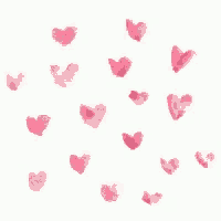 a pattern of pink hearts on a white background