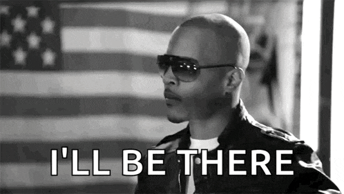 a man wearing sunglasses and a leather jacket is saying `` i 'll be there '' in front of a flag .