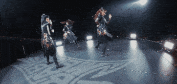 a group of people are dancing on a stage with a logo that says bbz