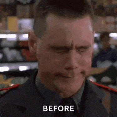 a man in a suit and tie is making a funny face with his eyes closed and the words before written on the bottom .