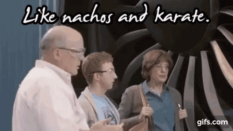 a group of people are standing next to each other in front of a large fan and the words `` like nachos and karate '' .