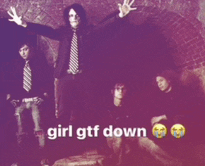 a group of people standing in front of a brick wall with the words girl gtf down below them