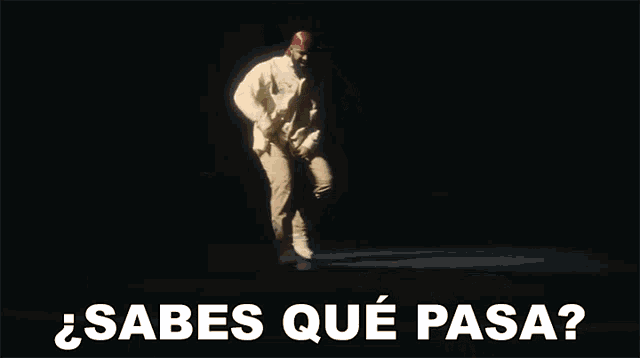 a man dancing with the words sabes que pasa written below him