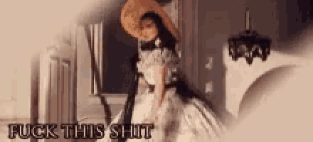 a woman in a white dress and a hat says fuck this shit