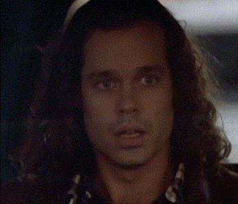 a close up of a man 's face with the word how written on it