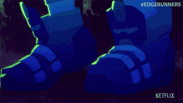a pair of blue shoes with a netflix logo on the bottom right