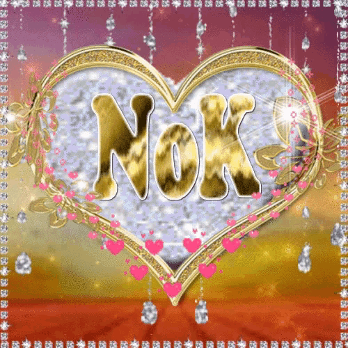 a heart with the word nok in gold letters