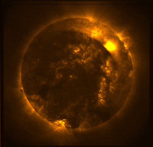 a picture of the sun with a black stripe on the bottom