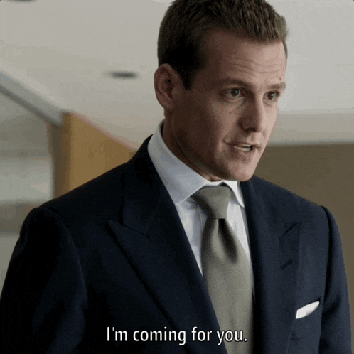 a man in a suit says " i 'm coming for you "