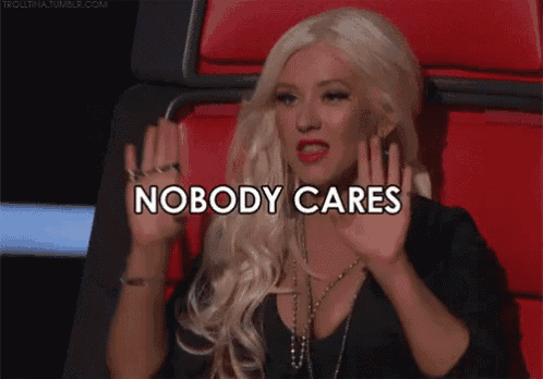 a blonde woman sitting in a red chair with the words nobody cares written above her
