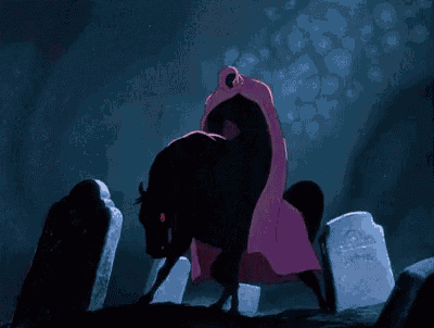 a black horse is walking through a cemetery with a red background .