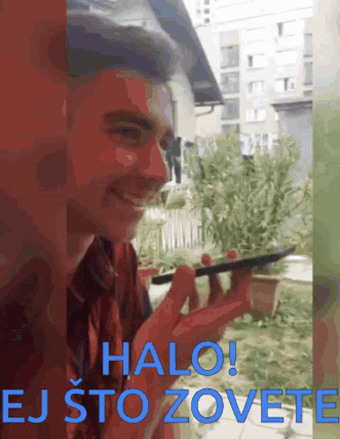 a picture of a man holding a tablet with the words halo ej sto zovete above him
