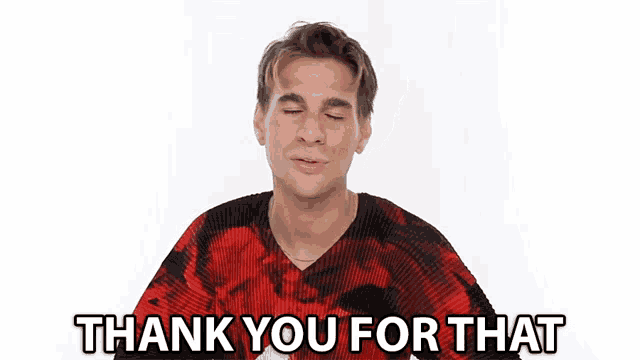 a man in a red and black shirt says " thank you for that "