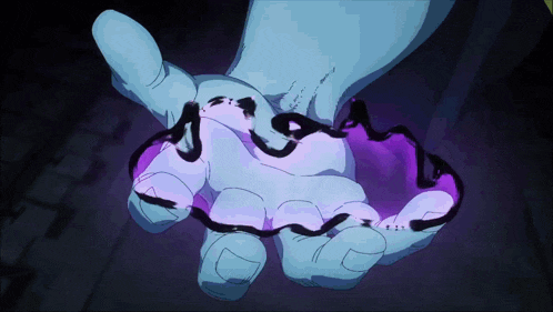 a person 's hand is holding a purple object in their palm