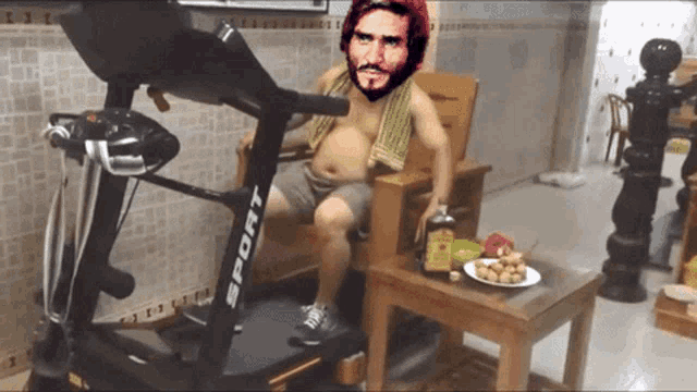a man sitting on a treadmill with the word sport on it