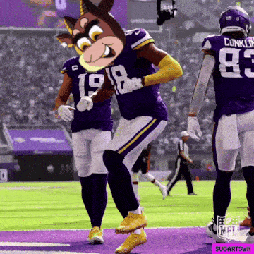 a football player with the number 18 on his jersey is jumping in the air