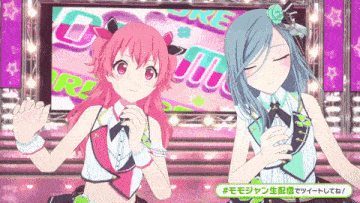 two anime girls are dancing in front of a large screen that says gmt