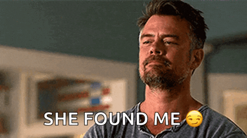a man with a beard is saying she found me with a smiley face .