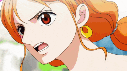 a close up of a woman 's face with orange hair and earrings