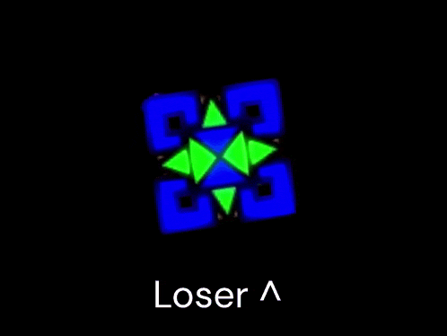 a stained glass window with green and blue triangles on a blue background .