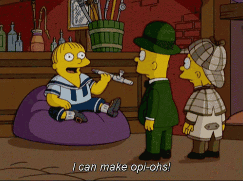 a cartoon character says " i can make opi-ohs " while sitting on a bean bag chair