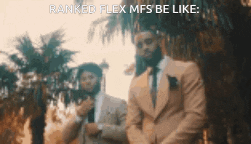 two men in suits are standing next to each other with the caption ranked flex mfs be like .