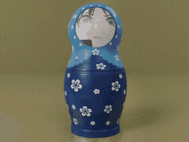 three russian nesting dolls with one saying what the fuck on it